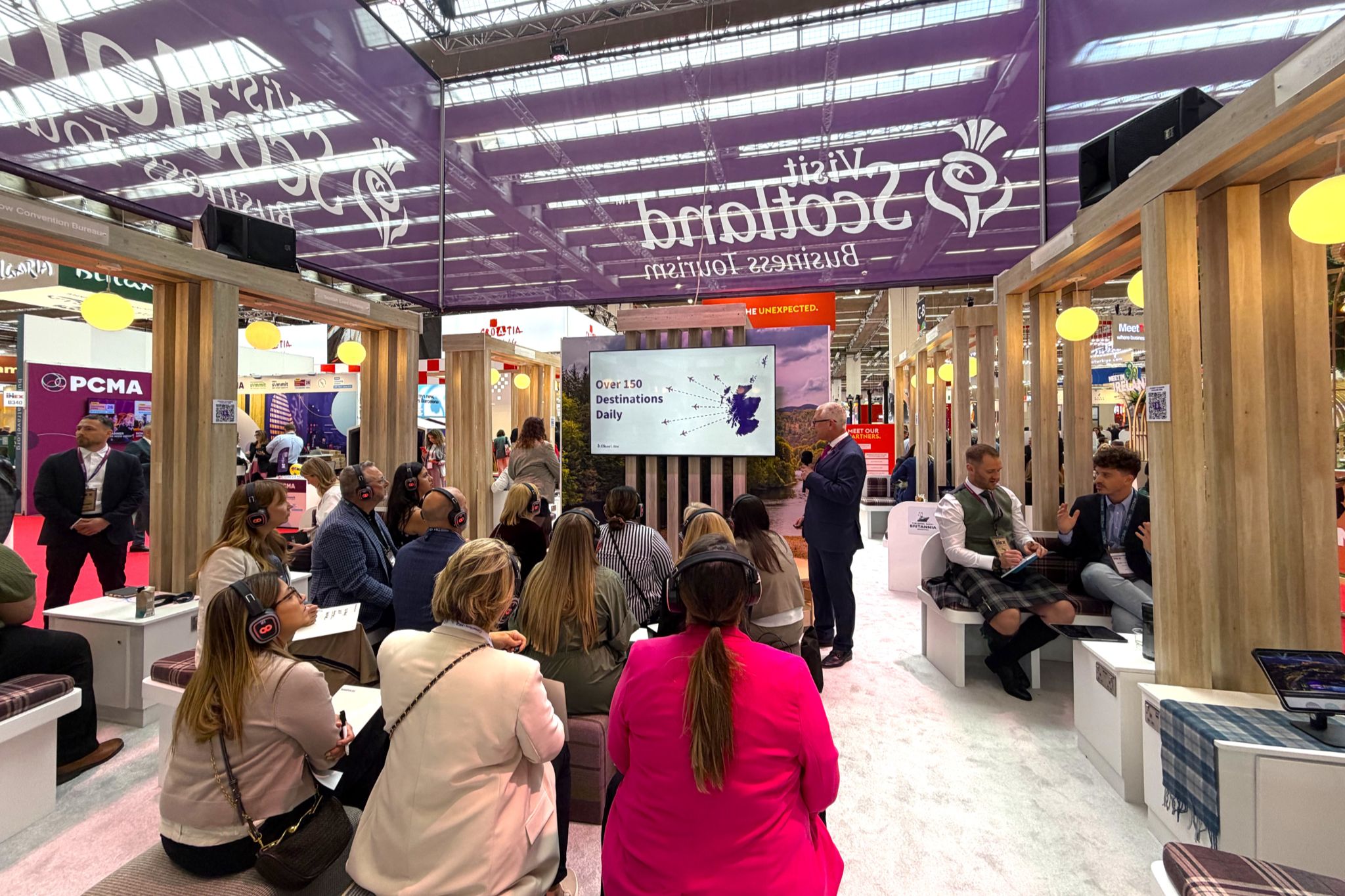 Business Events team delivers presentation to hosted buyers