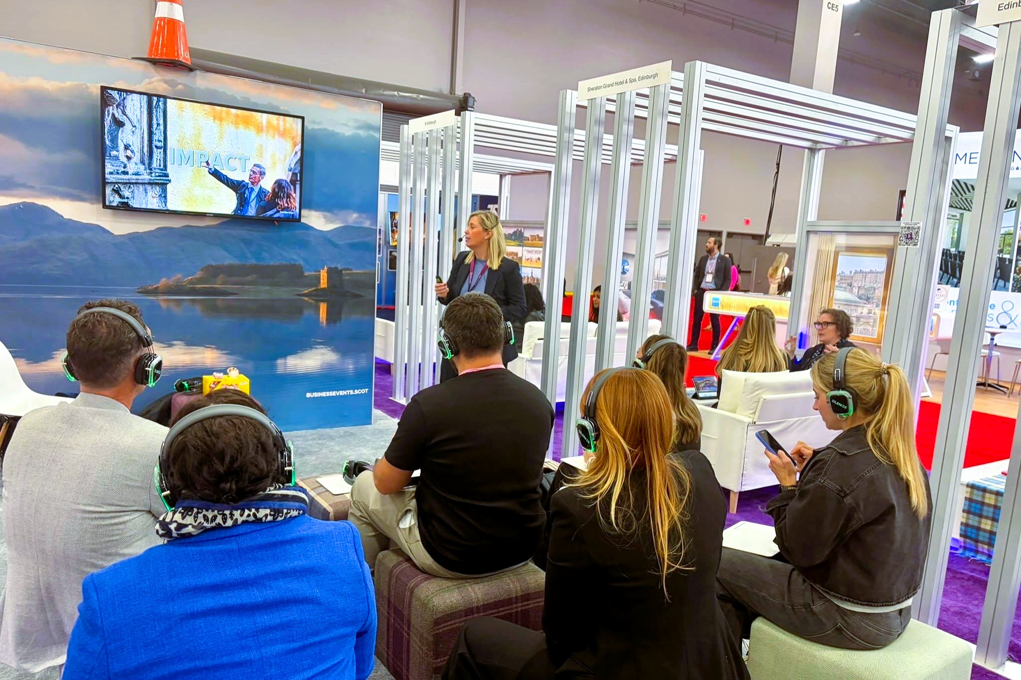 Business Events team delivers a presentation for hosted buyers